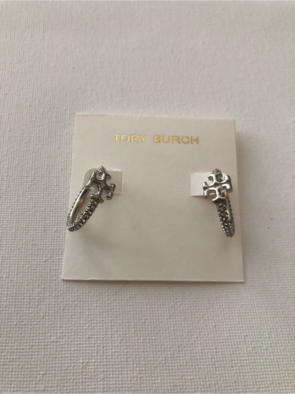 Tory Burch Silver Logo Crystal Huggie Earrings